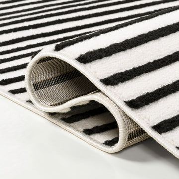Anders High-Low MidCentury Modern Arch Stripe Two-Tone Indoor/Outdoor Area Rug